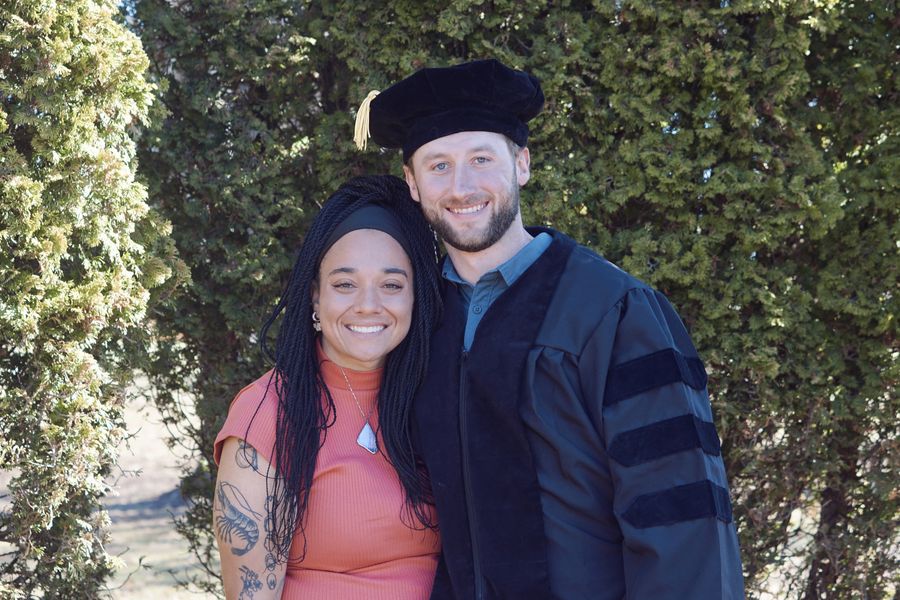 Taylor with her husband, Jack, in his doctoral robes and cap